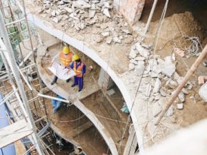 Workers building hotel