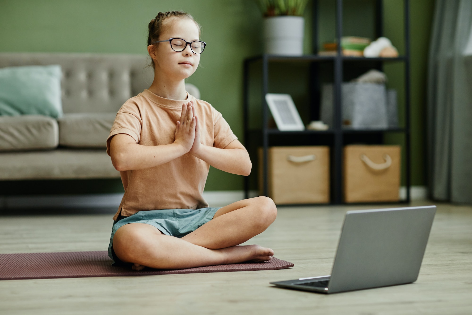 Girl with Down Syndrome in Yoga Class Online