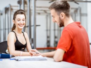 Woman during the medical consultation at the rehabilitation gym