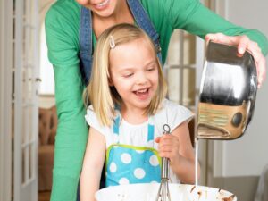 Mother and daughter cooking