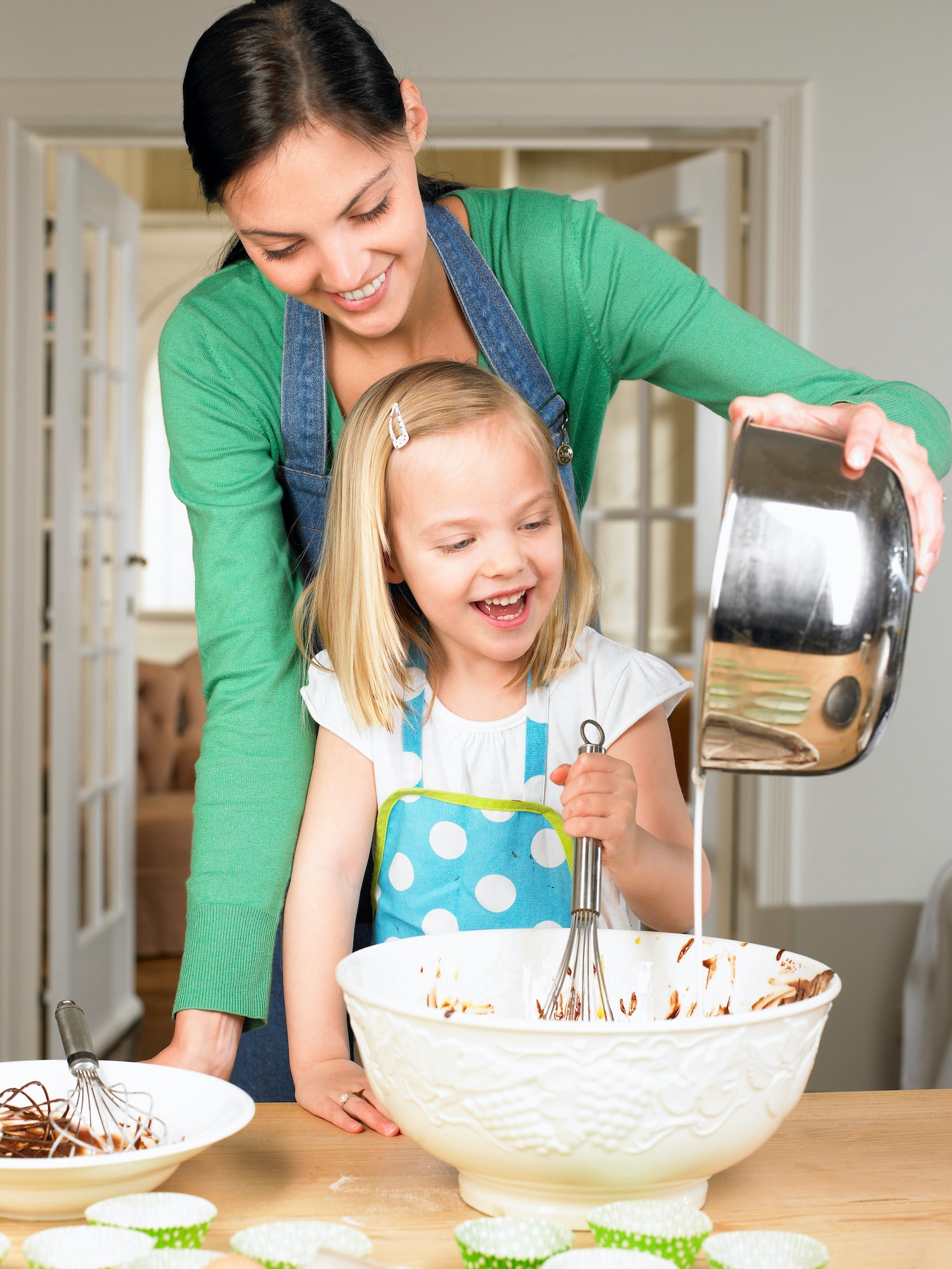 Mother and daughter cooking