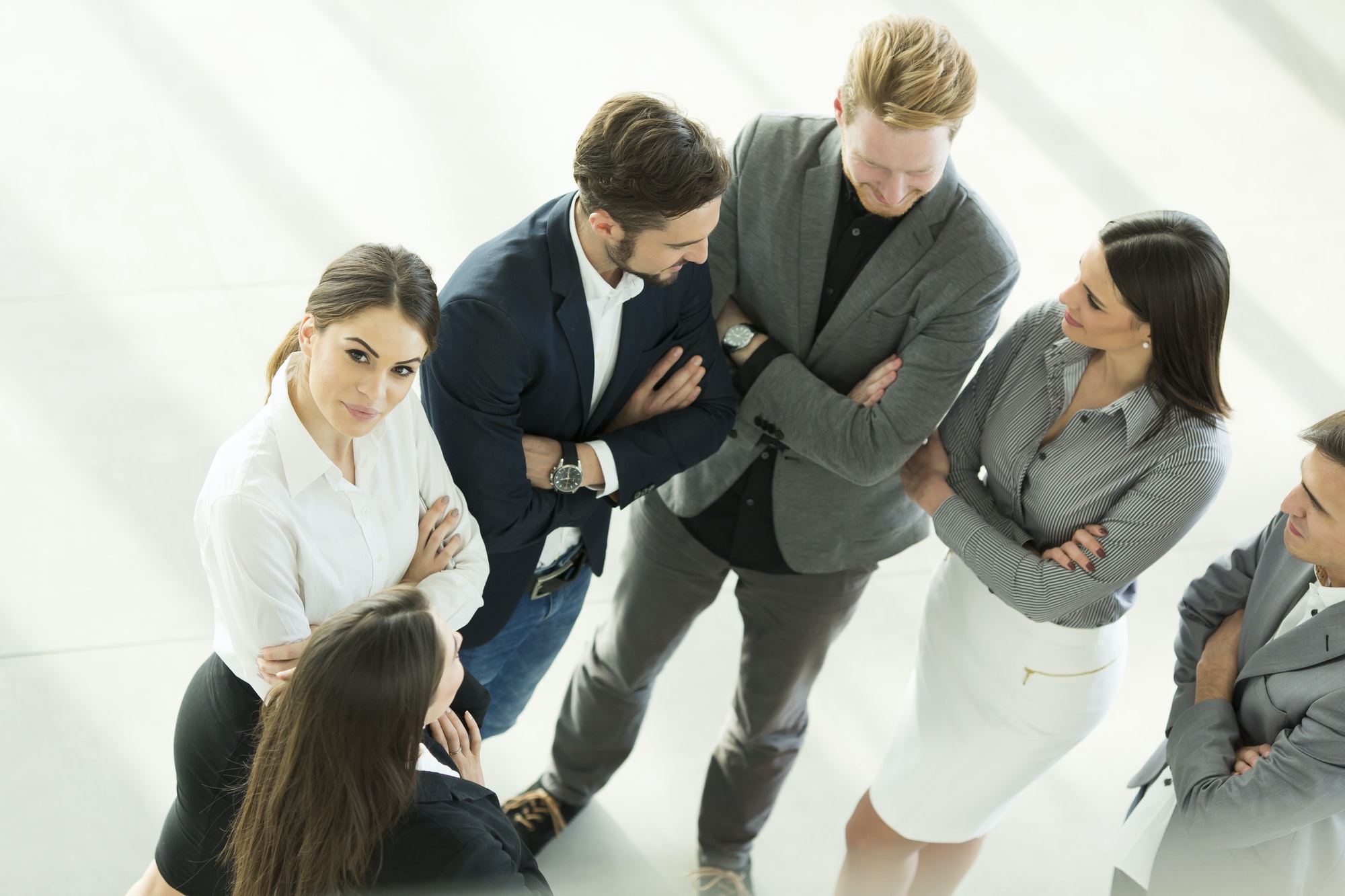 Young people in the office photographed from above