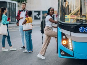 African american woman entering the bus